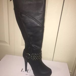 Black leather knee high boots